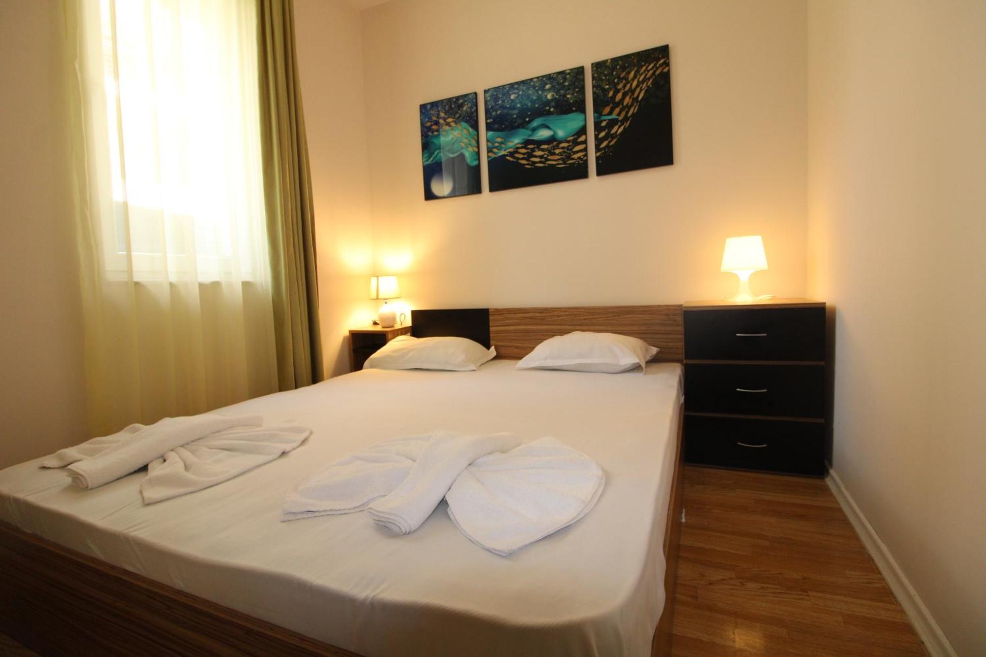 Menada Romance Marine Apartments Pantai Sunny Ruang foto