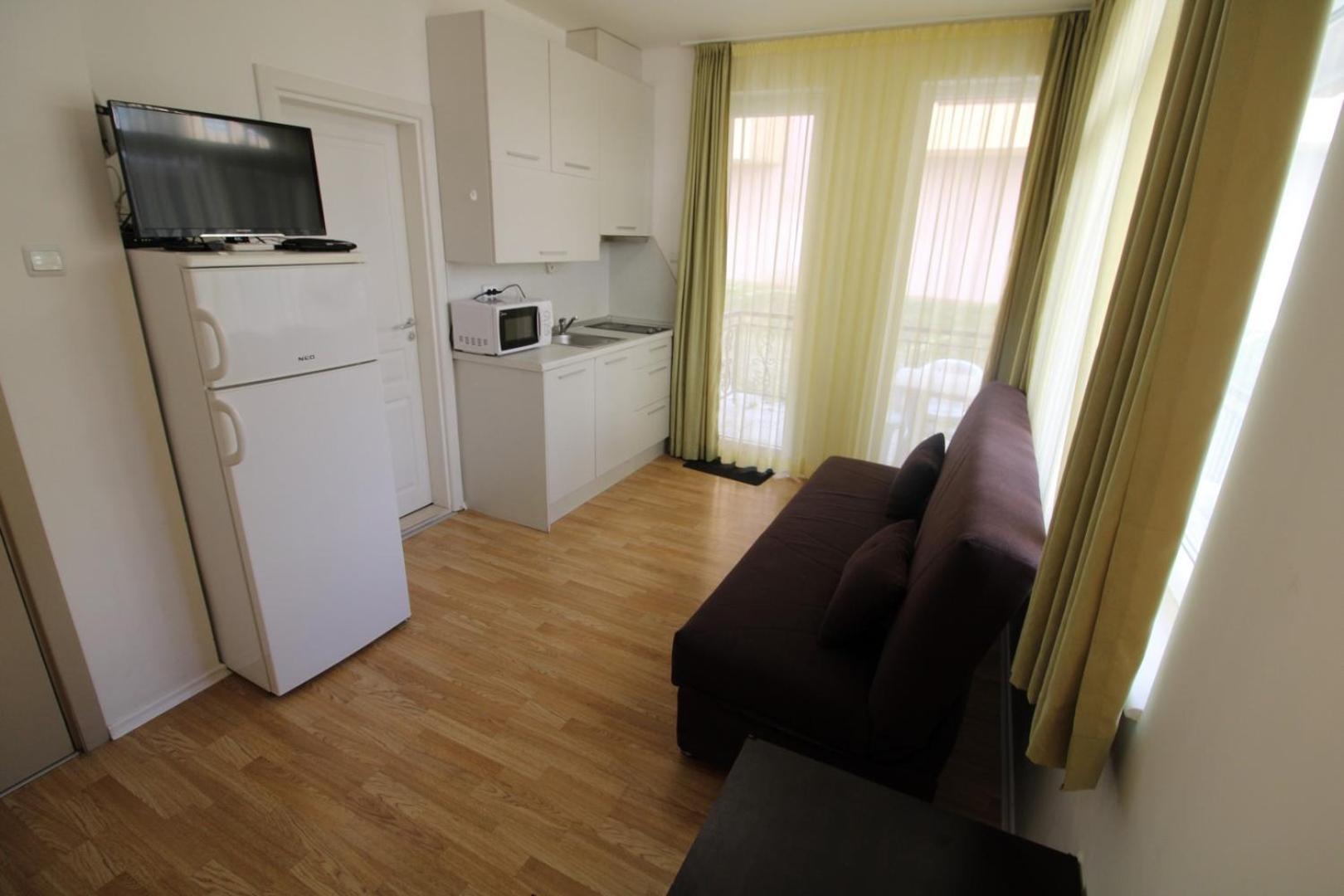 Menada Romance Marine Apartments Pantai Sunny Ruang foto