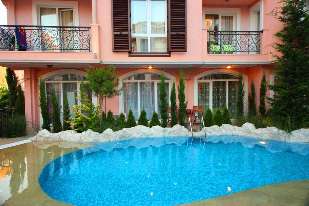 Menada Romance Marine Apartments Pantai Sunny Bagian luar foto