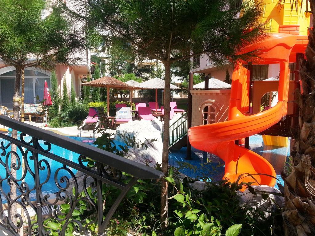 Menada Romance Marine Apartments Pantai Sunny Bagian luar foto