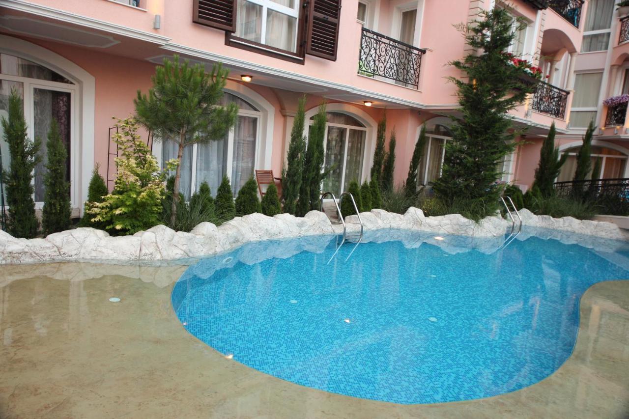 Menada Romance Marine Apartments Pantai Sunny Ruang foto